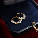 Twisted Gold-Plated Earrings with Pearl Detailing