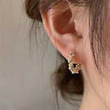 Twisted Gold-Plated Earrings with Pearl Detailing