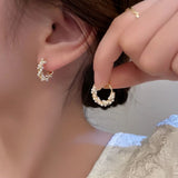 Twisted Gold-Plated Earrings with Pearl Detailing