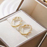Twisted Gold-Plated Earrings with Pearl Detailing